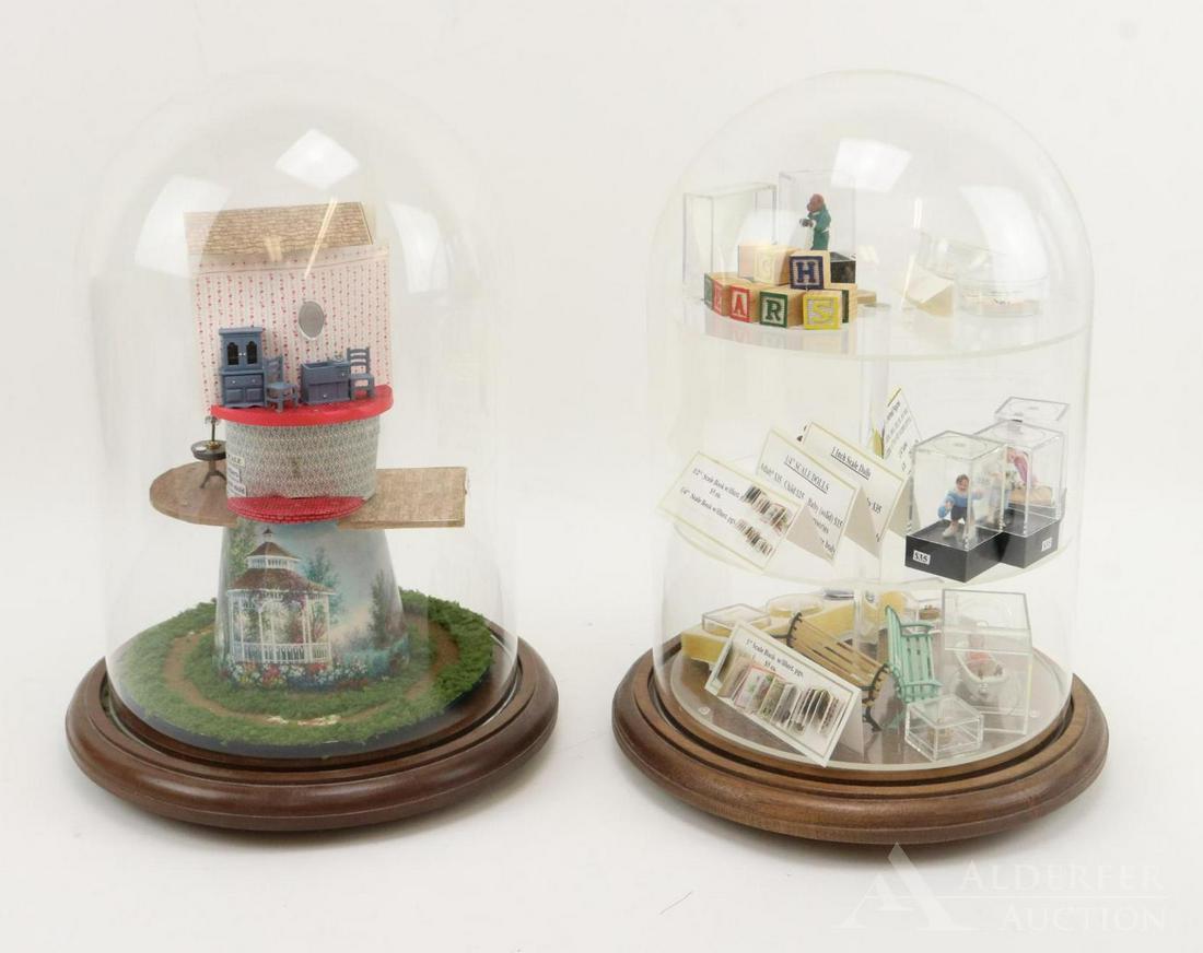 LOT OF MINIATURES IN (2) DOMES.: Each glass dome is 12" T on a wooden base. These were used to display samples of minatures that Regina sold/made. Individually sculpted dolls and animal figures. They are 1/4" , 1/2" and 1" scales. Do