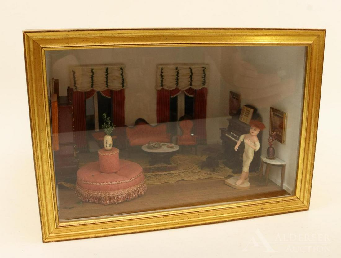 MINIATURE ROOM BOX.: "Victorian Parlor". Box measures 7" T x 10" W x 11" D. Round sofa was made by Robert E. Bernhard, Dolphin Originals. Victorian silk upholstered furniture was made by Nancy Summers. Figure sculpted by 