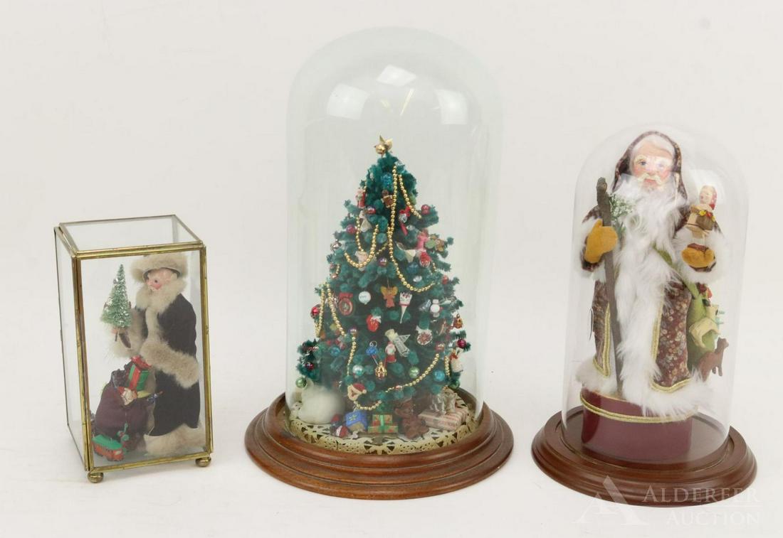 LOT OF HOLIDAY/NOVELTY.: Lot of (3) Christmas items in glass domes/case made by artist Regina Steele. 4 1/2" Santa with sack of toys. Sculpted face. Glass case 6" T x 3 1/4". 8 1/2" Santa with sack of toys. He has a sculpted 