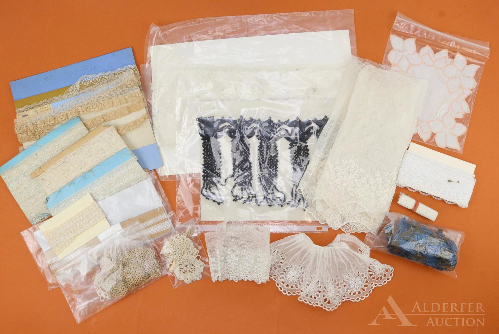 LOT OF HOLIDAY/NOVELTY.: Lot of antique laces, trims, beadwork for doll/other dressmaking. Various widths and lengths. 28" L x 4" W. 70" L x 10" W. (5) Cards of misc. lace inc. (2) marked France. (2) Cards of 1/4" W lace. 72"