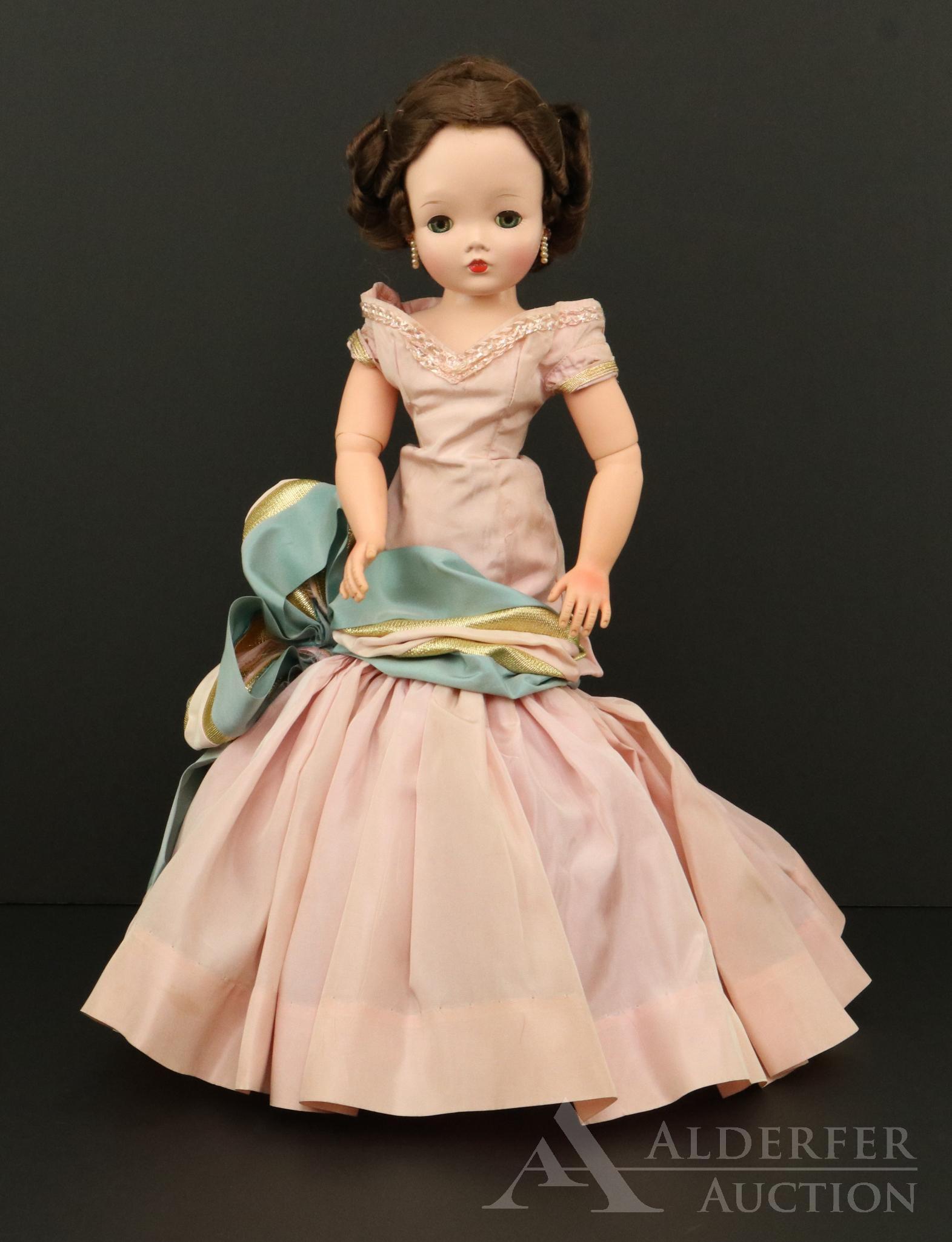 DOLLS OF THE 1950's-1960's.: Original owner doll. 20" Madame Alexander "Cissy" doll. 1955 Brunette Fashion #2100. All original tagged clothing, black heels. Condition: hair has been restyled. Skirt has been mended. Minor age disc