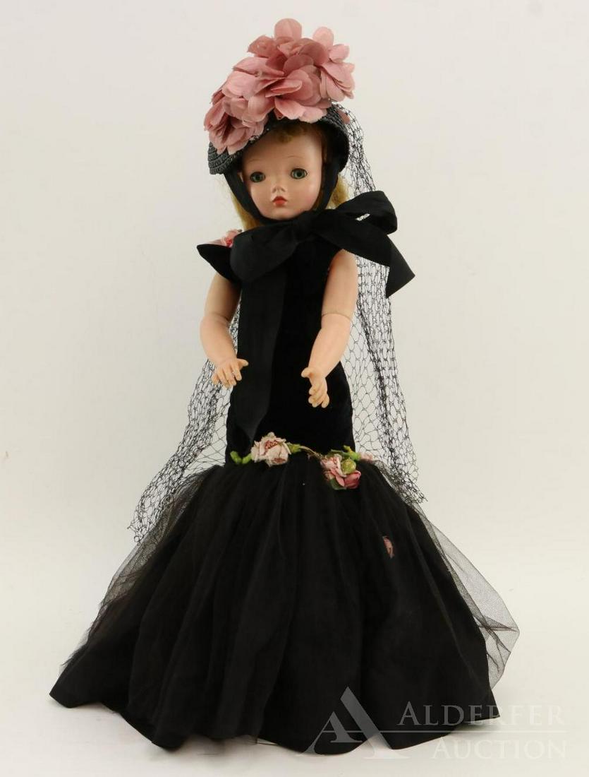 DOLLS OF THE 1950's-1960's.: 20" Madame Alexander "Cissy" doll. 1956 Honey blonde Fashion #2042 from the Fashion Parade Series. All original tagged clothing with the addition of the hat. Black heels with pink roses and elastic. C