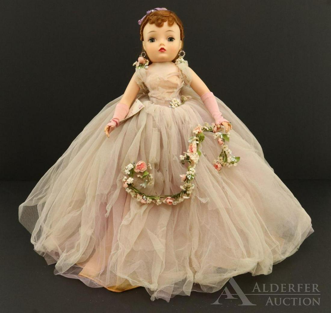 DOLLS OF THE 1950's-1960's.: 20" Madame Alexander "Cissy" doll. 1960's Redhead dressed in the tagged "Cissy Lilac Portrait" outfit. Original hang tag. Silver heels. Pink mitts, rhinestone earrings, diamond ring. Hair has not been