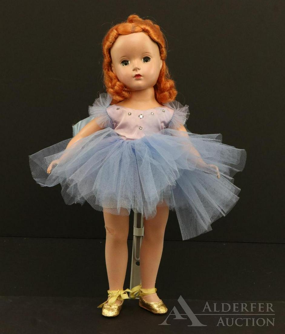 DOLLS OF THE 1950's-1960's.: 14" 1951 Madame Alexander hard plastic "Margot"? Ballerina with Margaret O'Brien face, red hair. Dressed in tagged lavender tutu, gold foil slippers. Condition: age fading on clothing. Hole in stockin