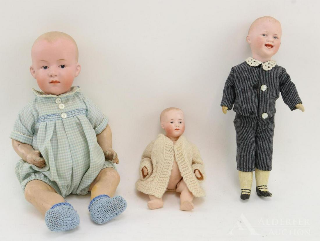 GERMAN BISQUE HEAD DOLLS 12" AND UNDER.: Lot of (3) Heubach character dolls with solid domes, blue integlio eyes, painted blonde hair. Pair of baby dolls with closed mouths. 5 Pc. papier mache bent limb baby bodies. 6" (Heubach square) GERMA