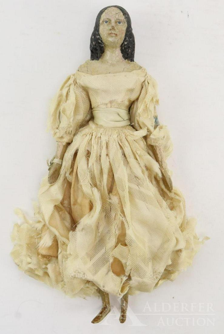LOT OF PAPIER MACHE DOLL(S).: 13 1/4" "Millner's Model" type doll. Molded black side curls wtih coiled bun on back. Blue eyes. Leather body with wooden lower limbs. Feet have no painted shoes. Blue paper garters. Dressed in antiqu