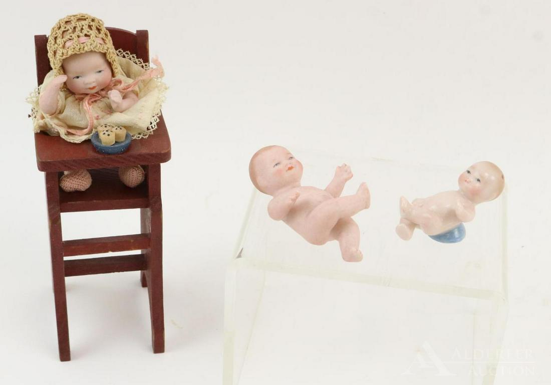 LOT OF ALL BISQUE DOLLS.: Lot of (3) Byelo Baby items. 2 1/4" L china Byelo salt shaker. 3 1/4" L Bisque Byelo figurine on back 2664. 4" Bisque doll marked with blue round label on stomach. Copr. by Grace S. Putnam Germany (on
