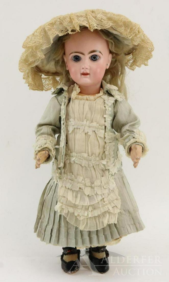 ANTIQUE FRENCH BISQUE HEAD DOLL.: 15 1/2" DEPOSE TETE JUMEAU 6 doll. Blue paper weight eyes, closed mouth, pierced ears, blonde mohair wig, cork pate. French papier mache jointed body with separate hands is marked (blue stamp) BEBE JU