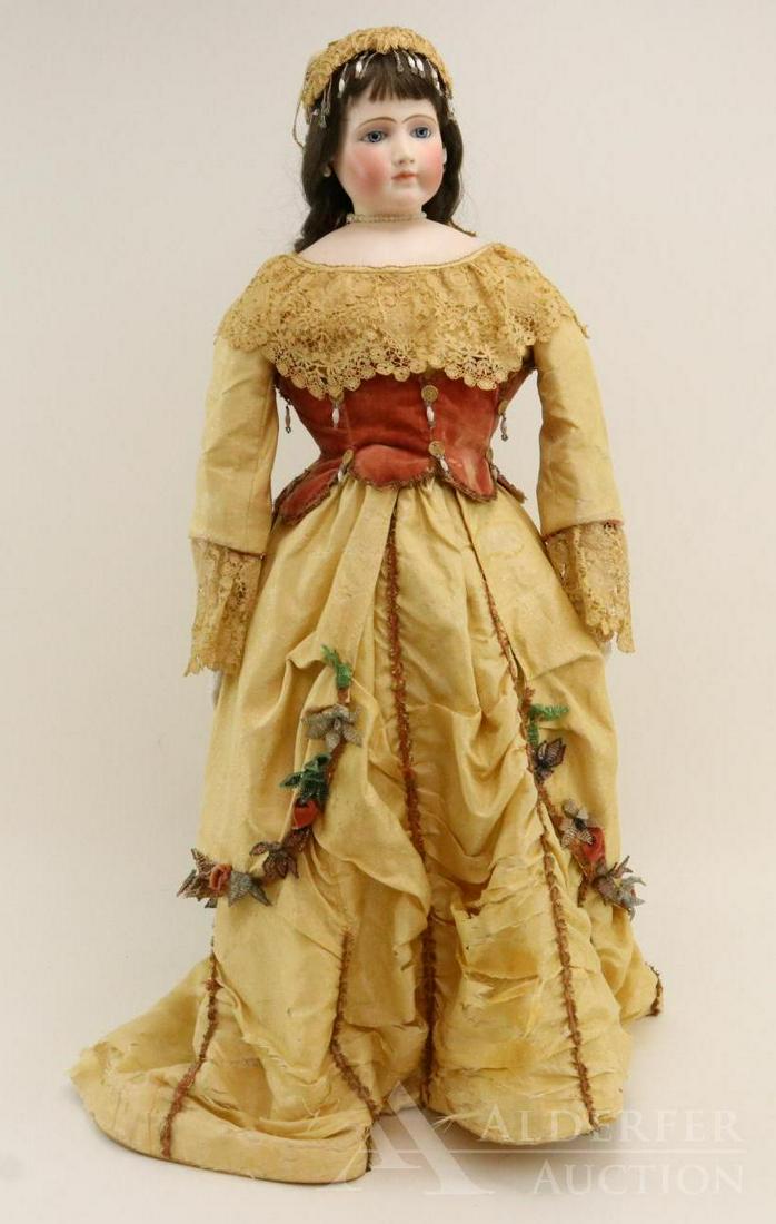 ANTIQUE FRENCH BISQUE HEAD DOLL.: 30" Unmarked Fashion doll. Stationary blue eyes, open mouth, pierced ears, dark brown curly French human hair wig. Socket head on separate bisque shoulder plate. Vintage cloth body with white leather 
