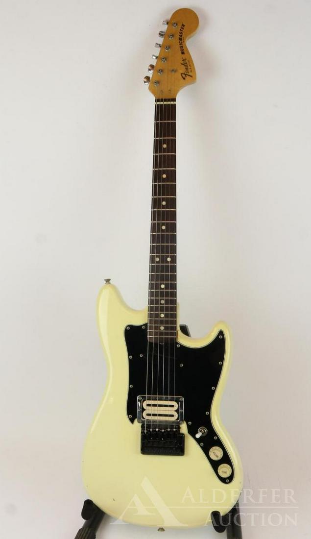Fender Musicmaster Electric Guitar: 1977/78 Music master model. Serial # S809707 Made in the USA Solid-body-electric. Original tailpiece replaced with Schecter adjustable tailpiece. Vintage padded gig bag.