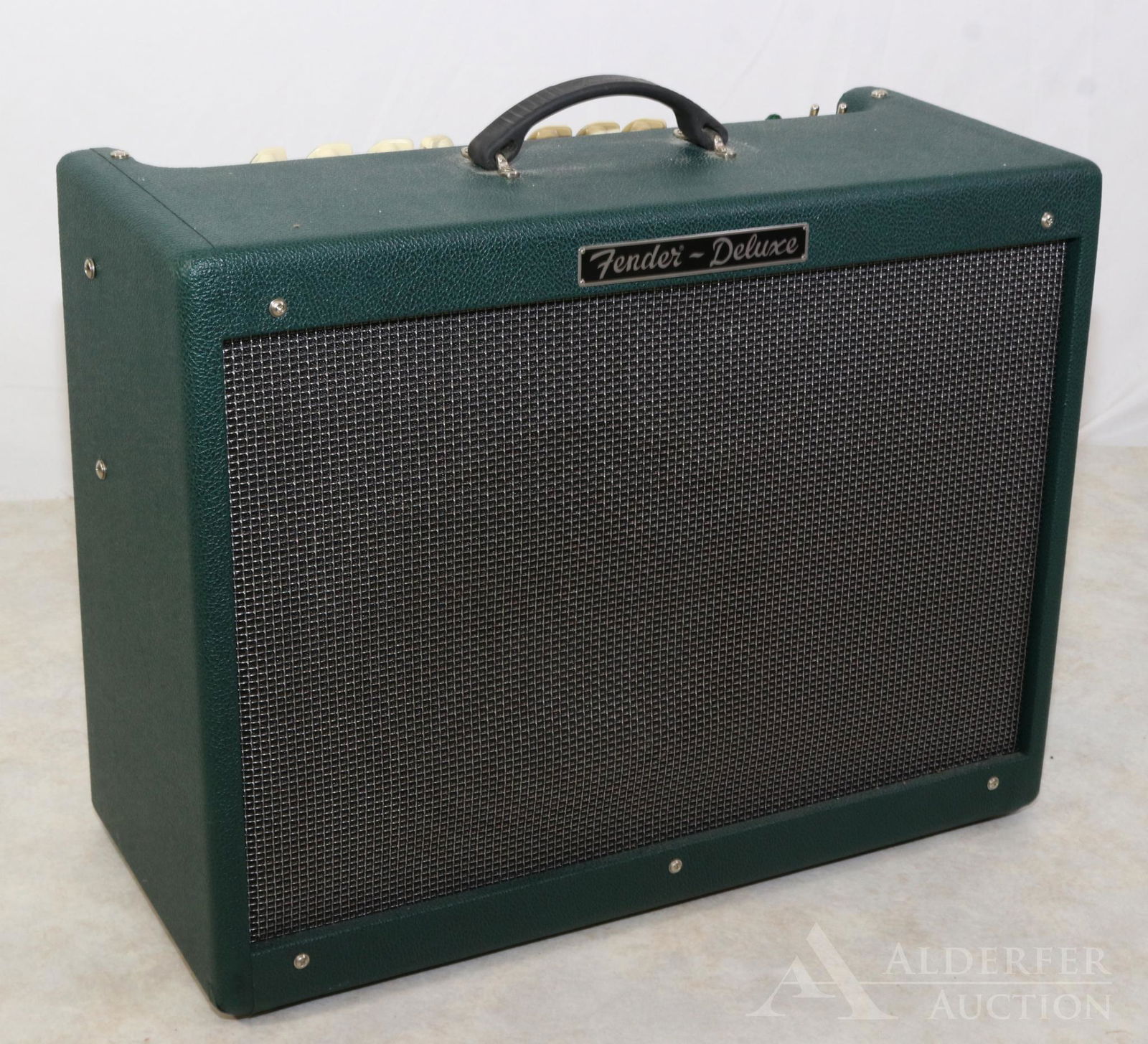 Fender "Hot Rod" Deluxe Amp: Rare color, only 100 produced in Robin Hood Green. Serial # B-268075. Type PR-246. 180w, 12"speaker. With Foot switch, channel select and drive/more drive switches. 2 inputs. 23.5"x18"x9.5". W/cover.