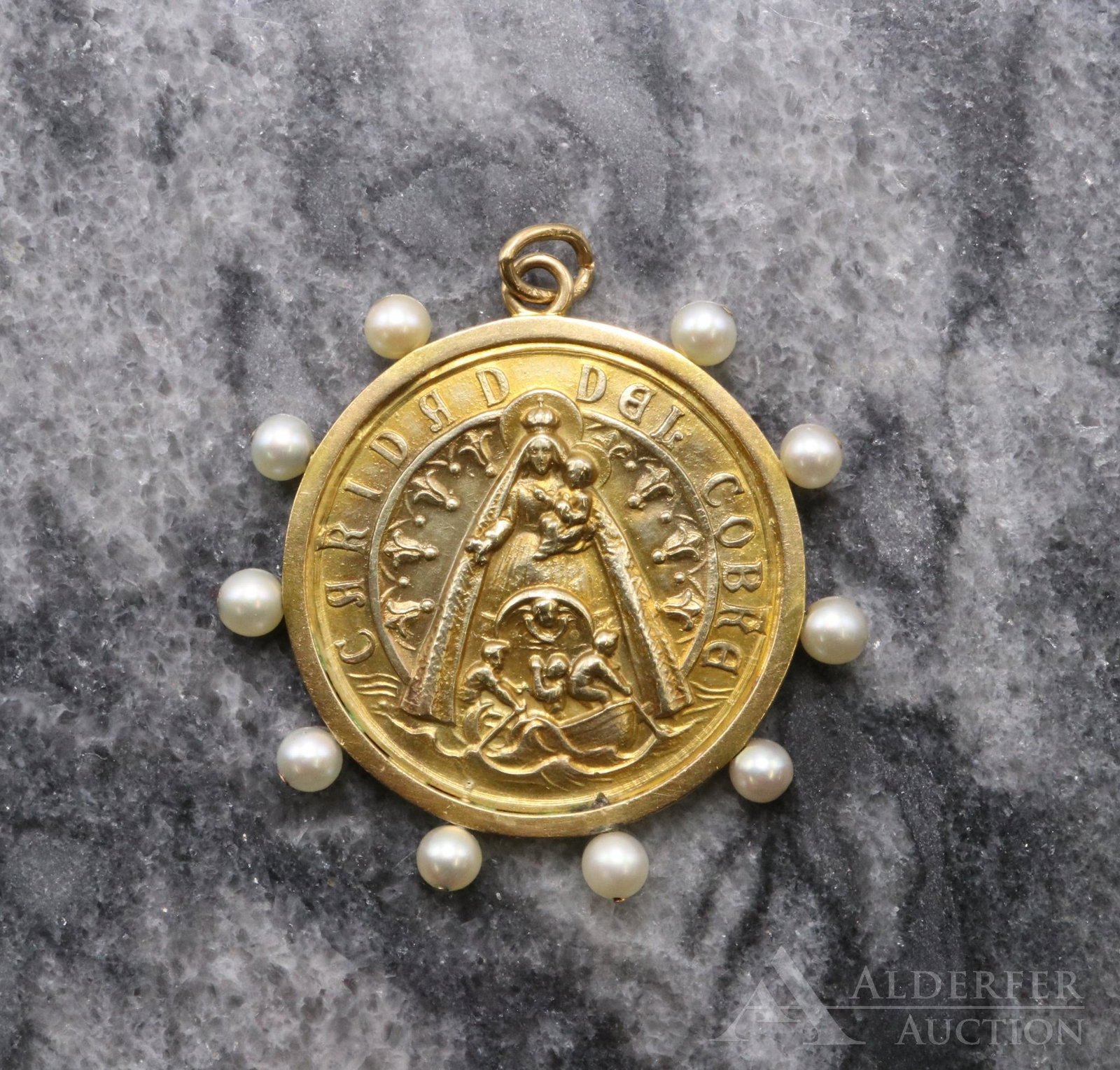 14KY Gold Our Lady of Charity Medal Pendant: Caridad del Cobre medal in frame spiked with pearls around edge. 12.9gtw