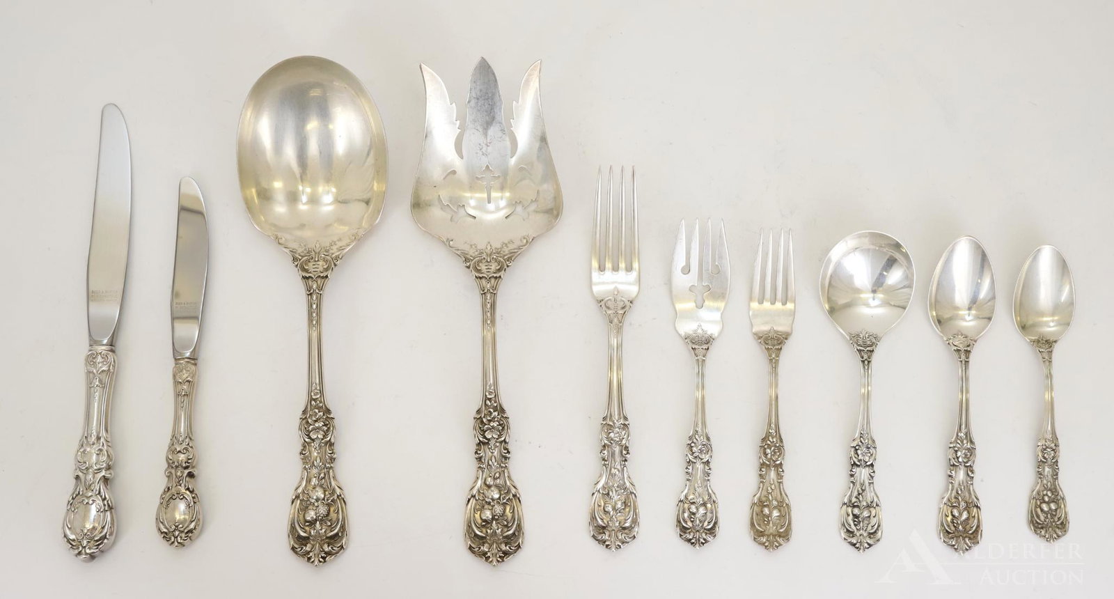 Reed & Barton Sterling Silver Flatware Service for 12: 81 pieces in the "Francis I" pattern including luncheon knives and forks, salad forks, soup spoons, hollow handled knives, hollow handled butter spreaders (7), teaspoons (24), salad serving set and a 