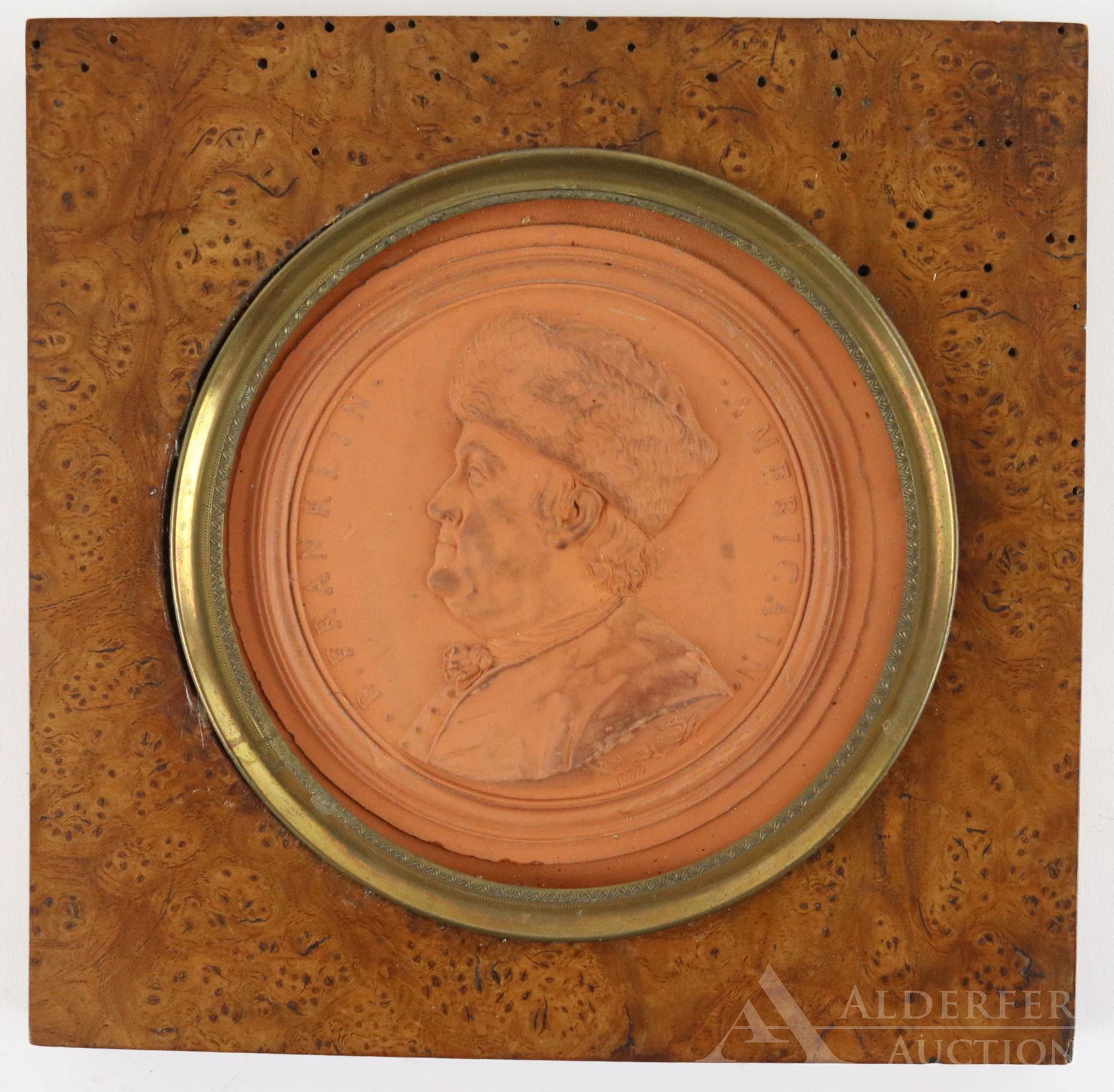 Terracotta Portrait Medallion of Benjamin Franklin by: Terracotta portrait medallion of early American statesman Benjamin Franklin by Italian sculptor and medalist Jean-Baptiste Nini (1717-1786). Medallion measures 4.5" in diameter and features bust profi
