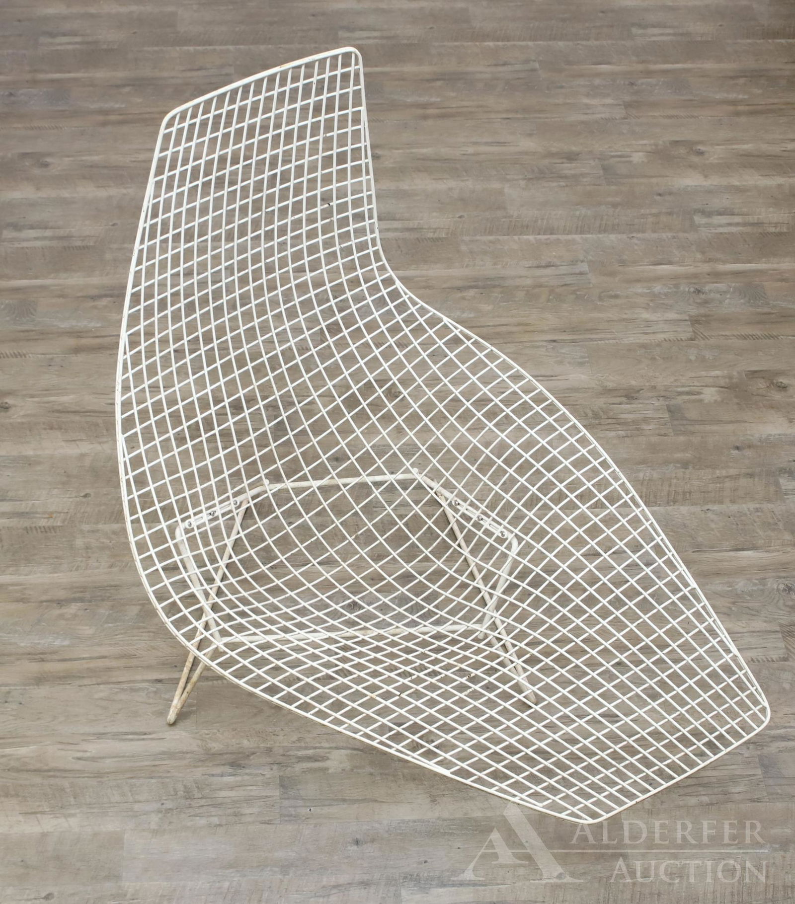Harry Bertoia for Knoll Asymmetric Chaise Lounge: Part of Harry Bertoia's Wire Collection. Bent and chrome steel welded rod construction with white Rislan finish. Oxidation is present. 39.5h" x 32w" x 44d"