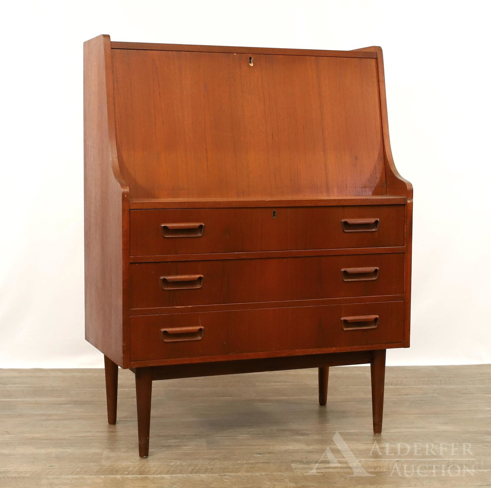 Maurice Villency Danish Teakwood Fall Front Desk: Fitted four drawer interior over three drawers on tapered legs. 44.75h" x 33.5w" x 17.25d"