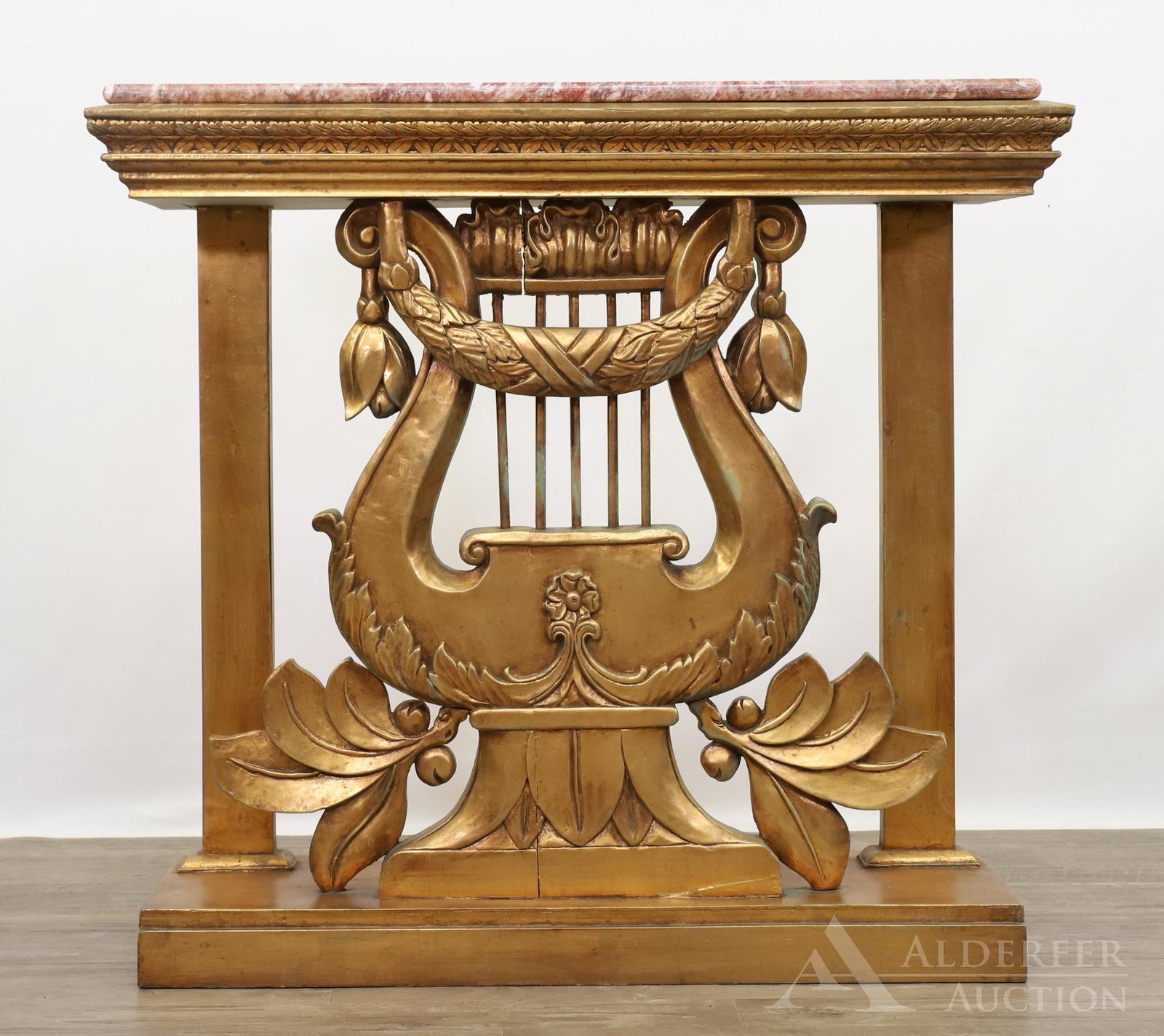 Marble and Parcel Gilt Pier Table: With bell flower and foliate decoration. 33.25h" x 36w" x 12d"