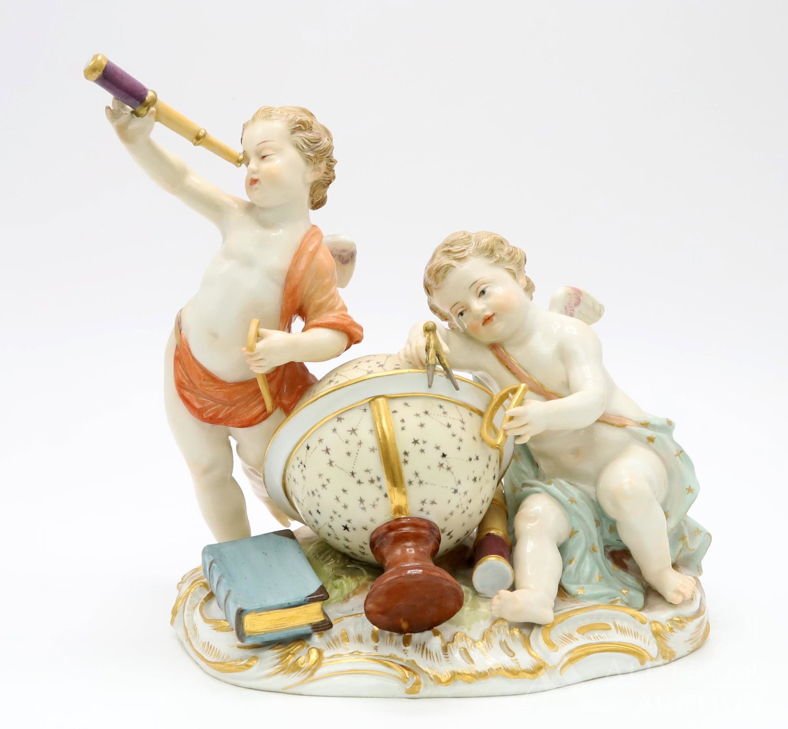 Meissen Allegorical Figurine of Astronomy: Meissen porcelain figure, after a model by C.C. Punct, of two putti, one standing holding a telescope to his eye, a book at his feet, the other using a pair of dividers on a celestial globe, the grass