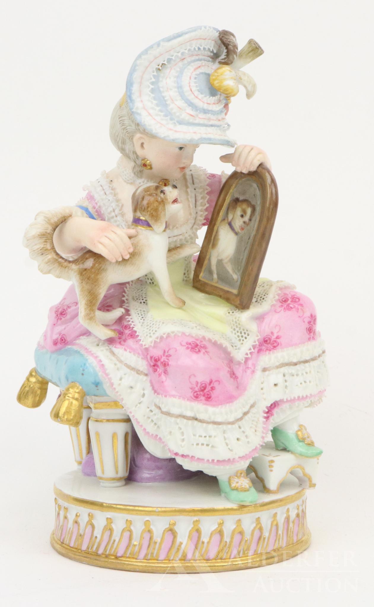 Meissen Figurine of a Young Girl: Meissen figurine of a young girl in 18th c. dress with a puppy on her lap looking at its reflection in a mirror, on a gadrooned base. Crossed swords mark and incised mark F 50, impressed 100 and pain