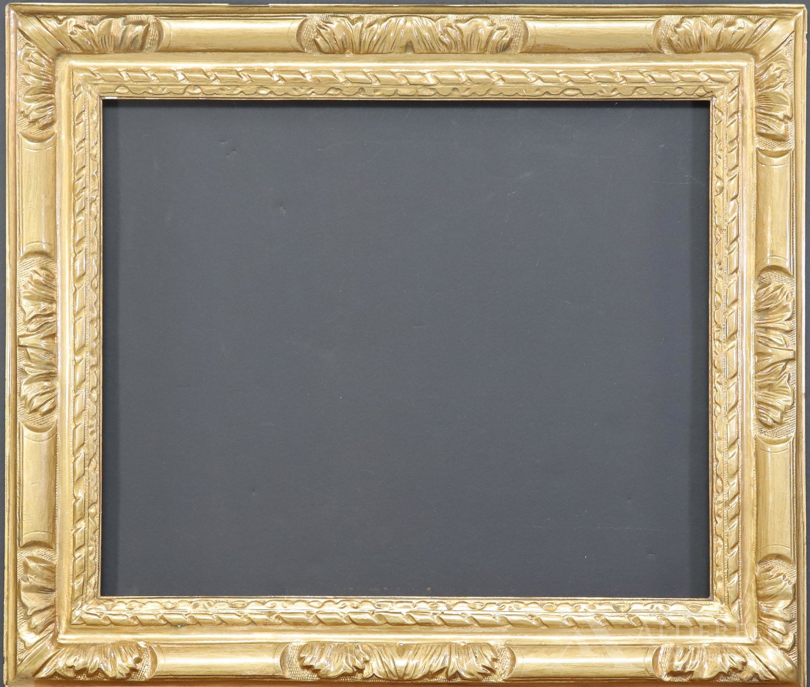 Newcomb Macklin Frame: Gold frame. 15.5"h x 18.5"w rabbet, 19.5"h x 23"w overall and 2.75"w frame