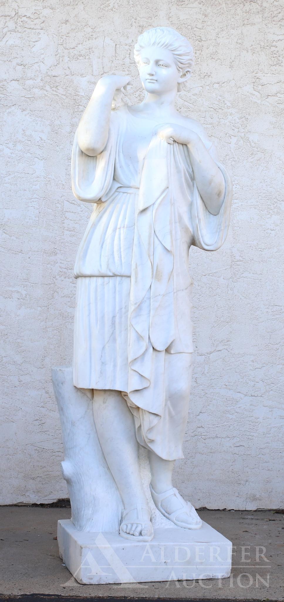 Alabaster Sculpture: Classically designed sculpture of a Greek/Roman woman wearing a toga and sandals. 79"h x 22"w x 17.5"d