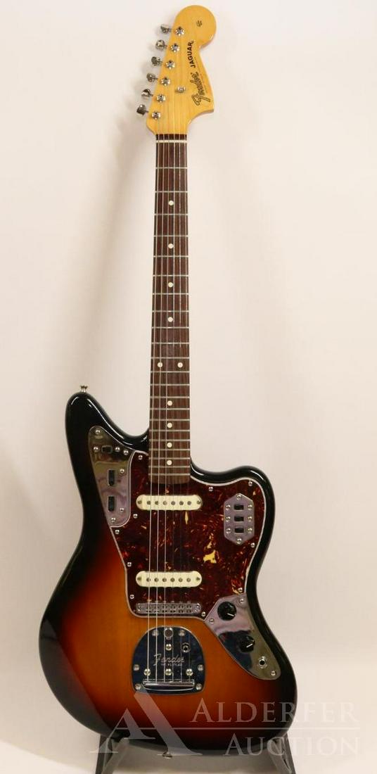 Fender Jaguar Electric Guitar: Fender Jaguar Serial # MZ8045798 c.2008 Tri-color sunburst finish. Bright chrome, no pitting. Like-new condition. Paperwork and trem bar incl. Plush-lined, hard-shell case.
