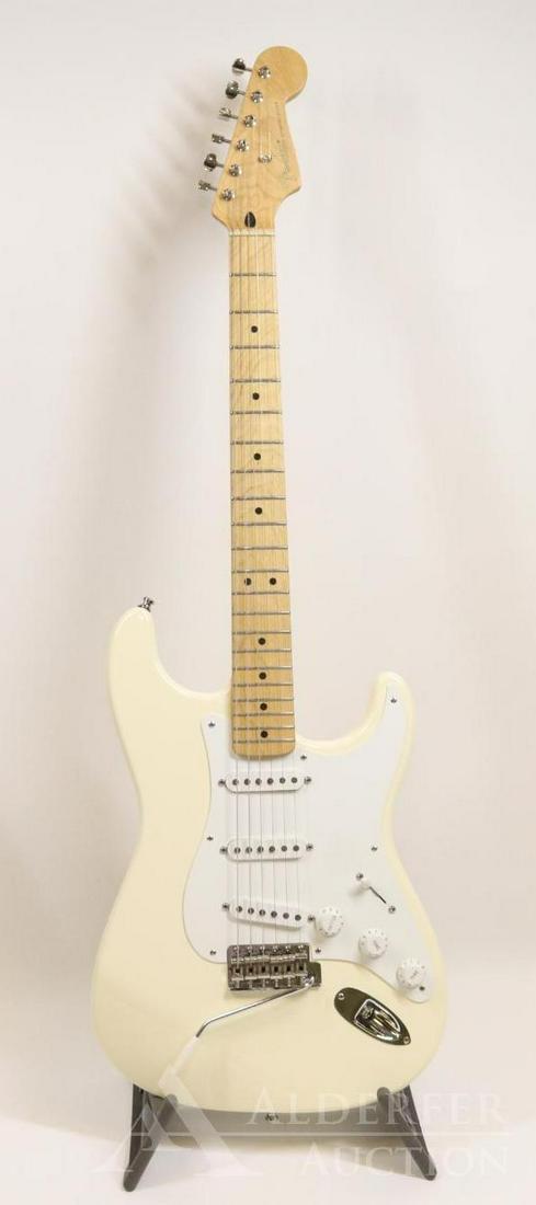 Fender Stratocaster Jimmy Vaughn Signature Edition: Jimmy Vaughn edition Stratocaster. Serial # MSN501781 c.2005 Made in Mexico Cream with white pick guard. Maple neck with walnut inlay on back. With Guitar Research hard shell case. Levy's leather st