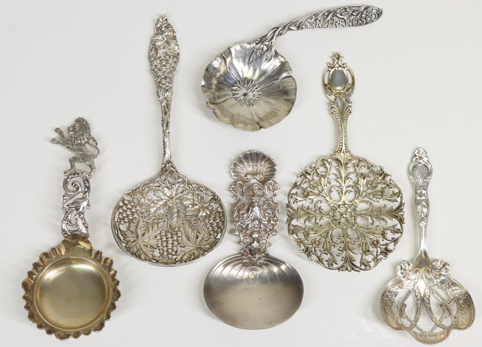 Art Nouveau Sterling Silver Bon Bon Spoons: Collection of 6 art nouveau styled sterling silver bon bon spoons. Makers include Gorham, Mechanics Sterling, R. Wallace & Sons, Shreve Treat & Eacret, and George W. Sheibler and Howard Sterling. 9