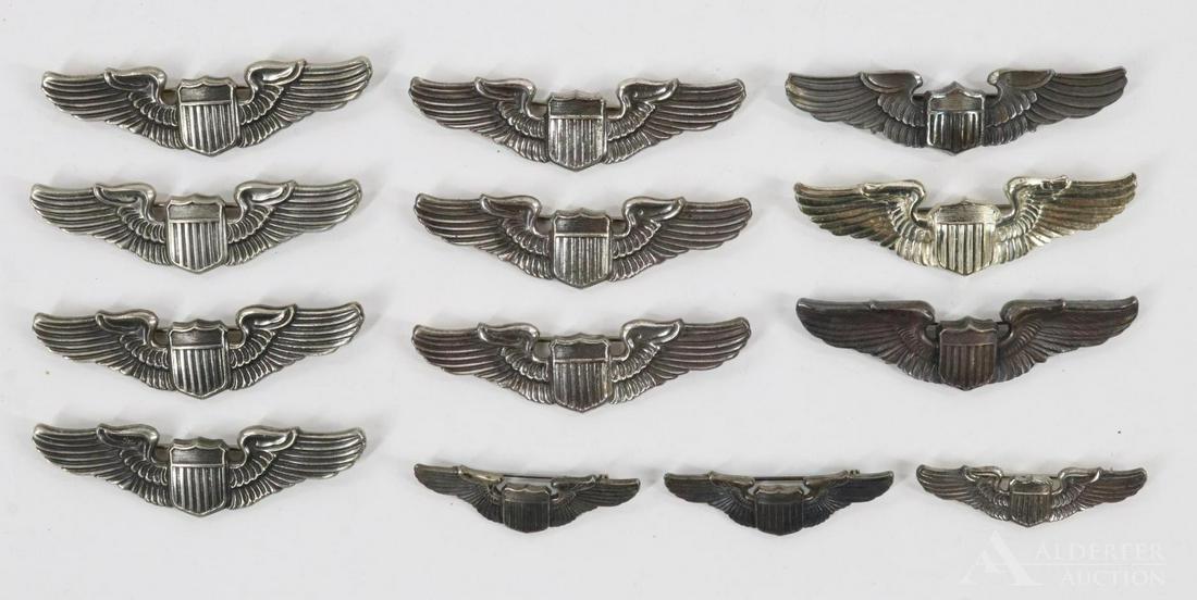 WWII Pilots Wing-Gimbel Provenance: Grouping of World War II pilot's wings belonging to Richard Gimbel (1898-1970). Grouping includes: 1.) Four-pinback full-sized wings marked sterling and NS Meyer, NY. 2.) Four -pinback full-sized wing