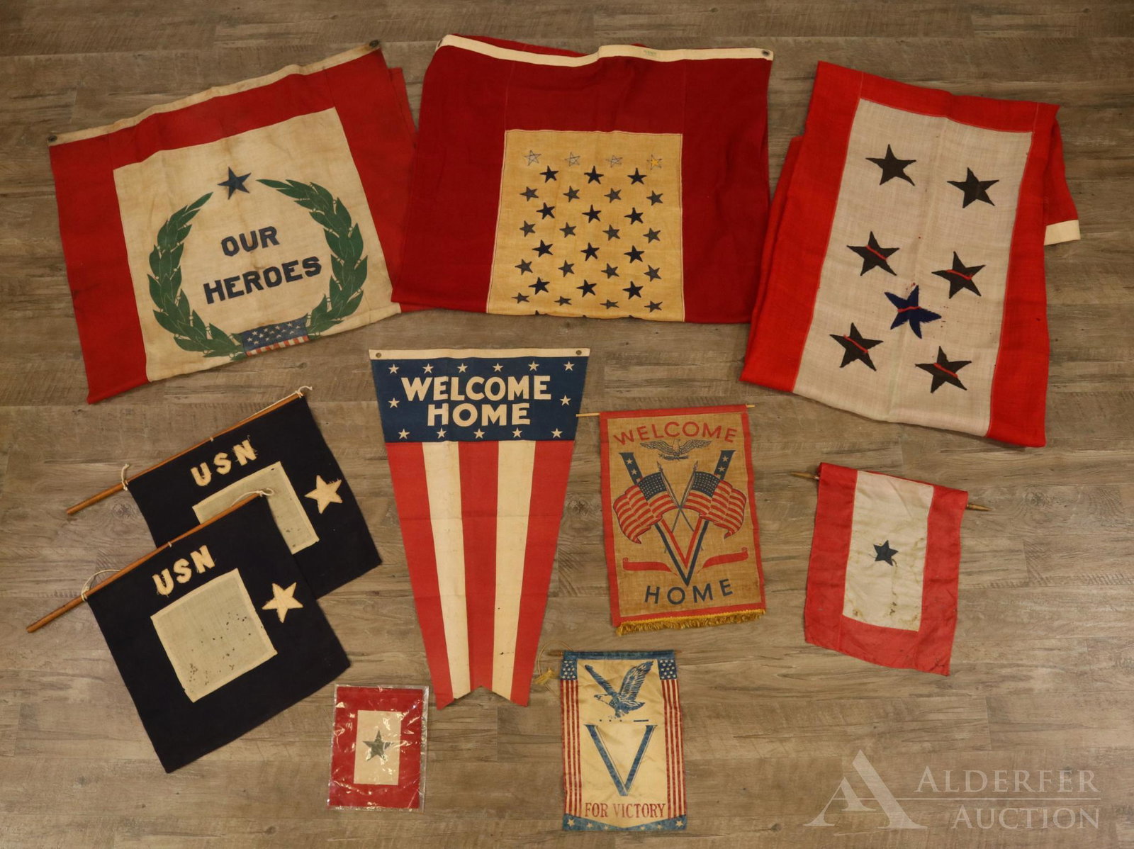 Historic United States Patriotic and Flag Related: Grouping of United States patriotic and flag related materials including ; 1.) Printed "Welcome Home" vertical pennant measuring 18" x 28.5" with grommets at top. Pennant exhibits folds with some rubb