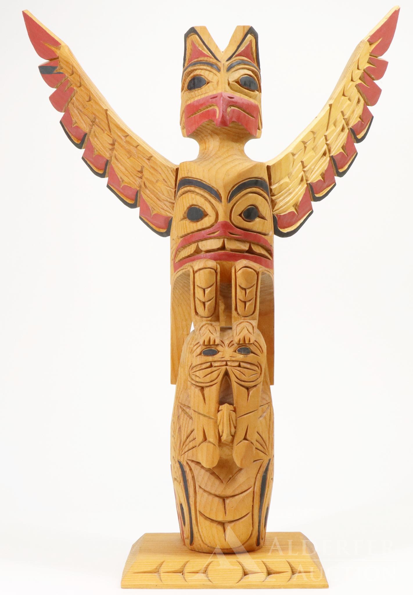 Hand Carved Totem Pole: Hand crafted totem pole by Master carver Eric Williams, signed en verso. Polychrome decorated. 21"h x 15"w