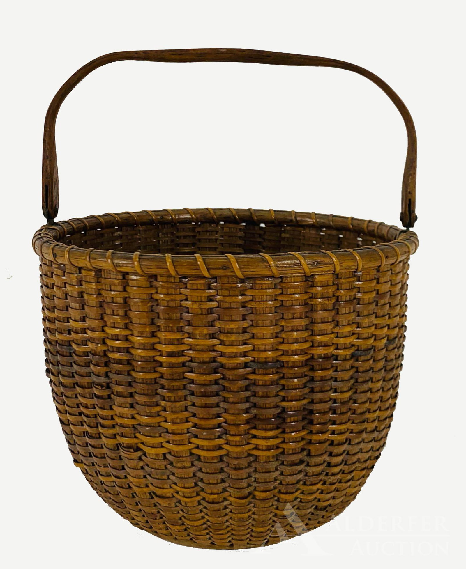 Clinton Mitchell “Mitchy” Ray (1877-1956): Nantucket basket made of white oak staves, handle attached with brass ears and turned bottom. Partial label on bottom. 6"h x 8" round