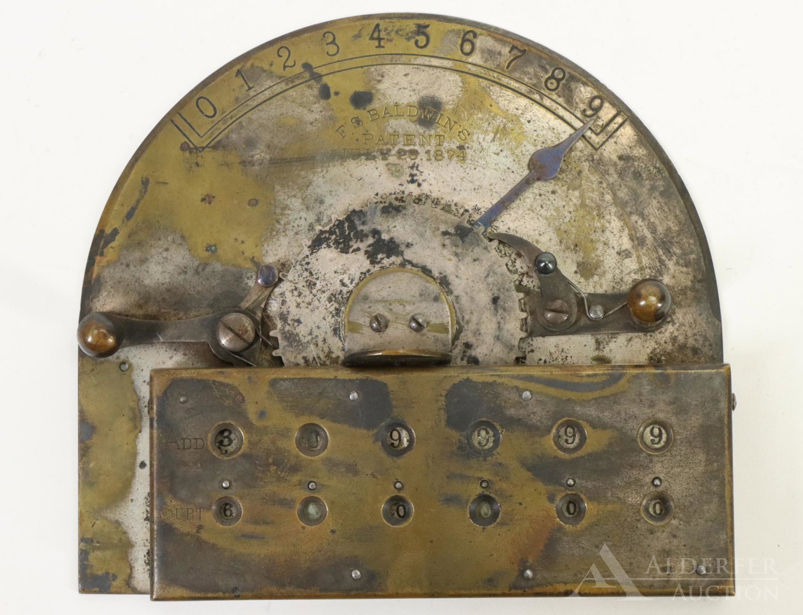 F.S. Baldwin's Arithmometer: Frank Stephen Baldwin's calculating machine for adding and subtraction of column of digits. Stamped numbers 0-9 on semi-circular top and patent date July 28, 1874. 4.75"h x 5.25"w