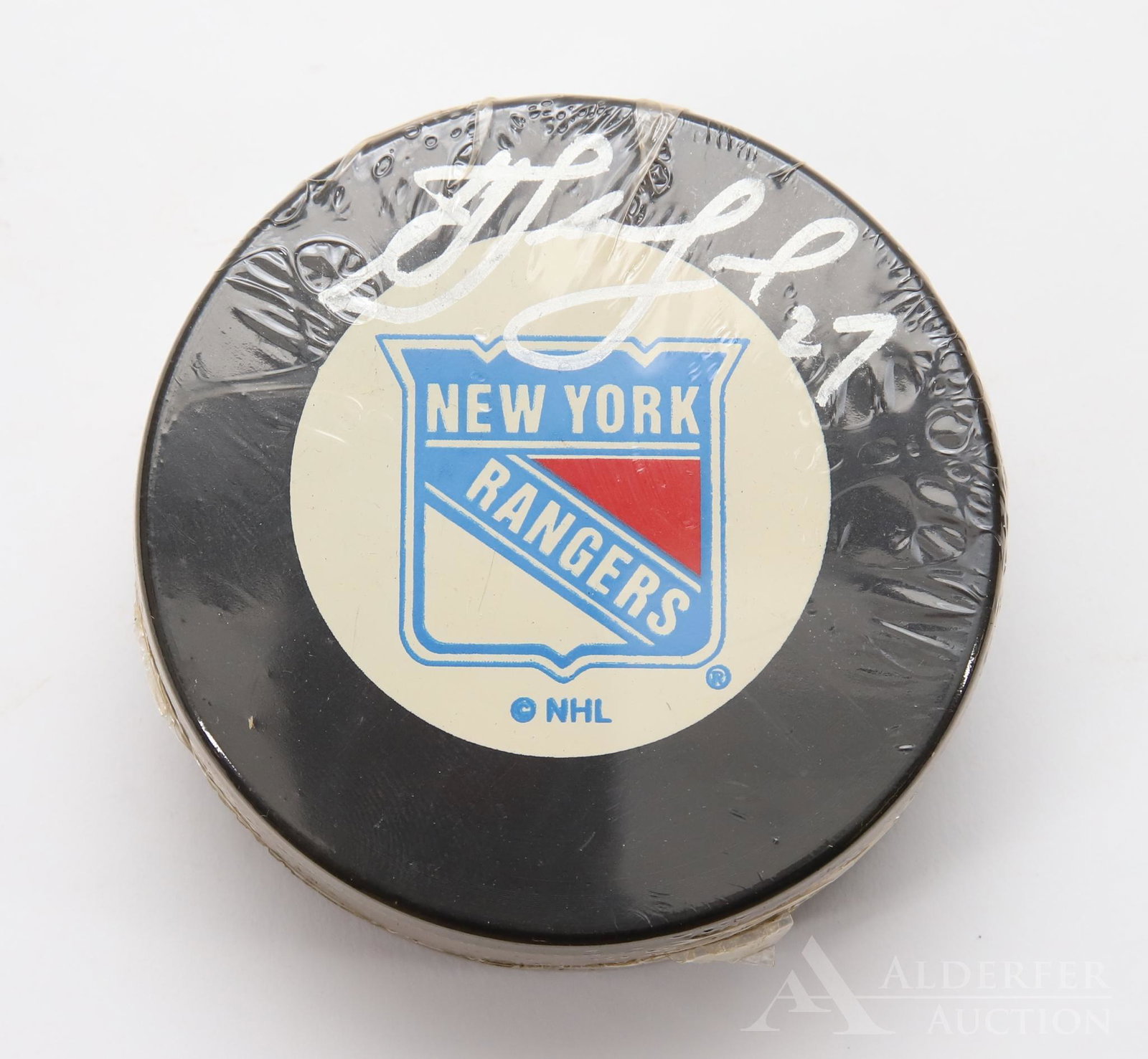 Alex Kovalev Autograaphed Hockey Puck: New York Ranger right winger Alex Kovalev autographed hockey puck