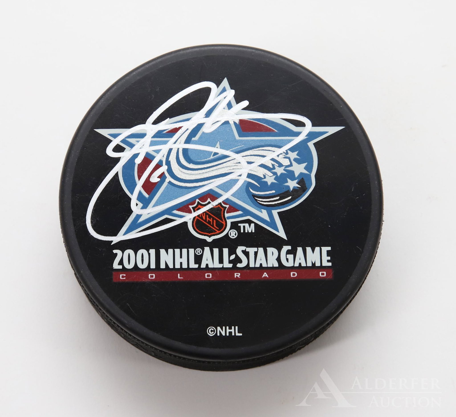 Joe Sakic Autographed Hockey Puck: Colorado Avalanche Hall of Fame center Joe Sakic autographed Hockey Puck