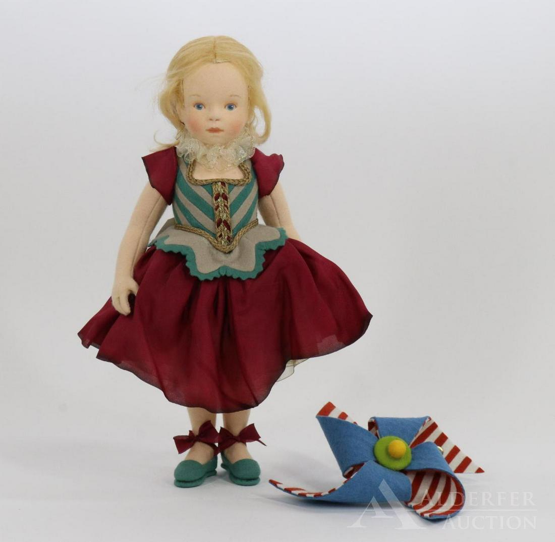 LOT OF R. JOHN WRIGHT.: Lot. 11 1/2" MIB "'Musette" doll, 2003 Le Bal Masque UFDC 54th Convention. Ltd. Ed. 1600. This doll is also a candy container. Also comes with the tagged all felt pinwheel.