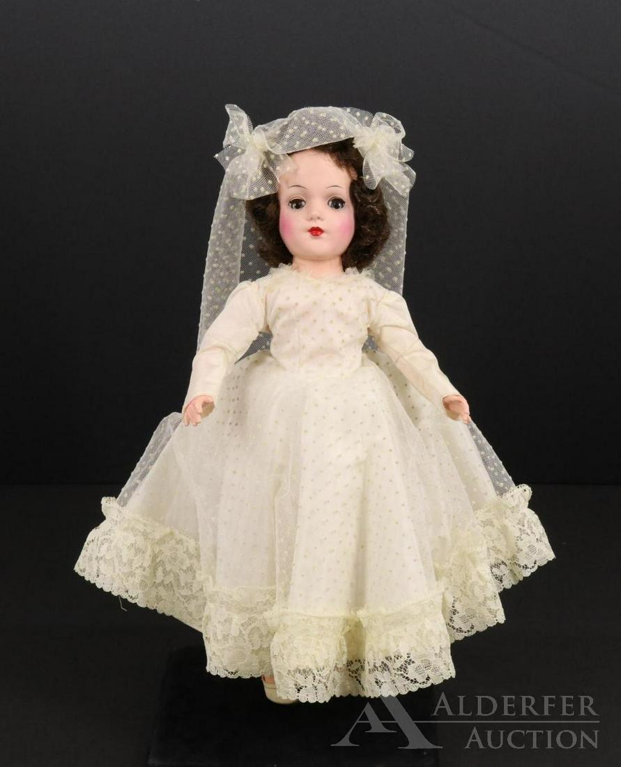 DOLLS OF THE 1950's-60's.: This is an original owner doll. MARY HOYER doll in OB. Blue eyes, beautiful coloring. Uncombed brown wig. Dressed in tagged wedding gown with veil, tagged petticoat, ivory oilcloth shoes. Condition: B
