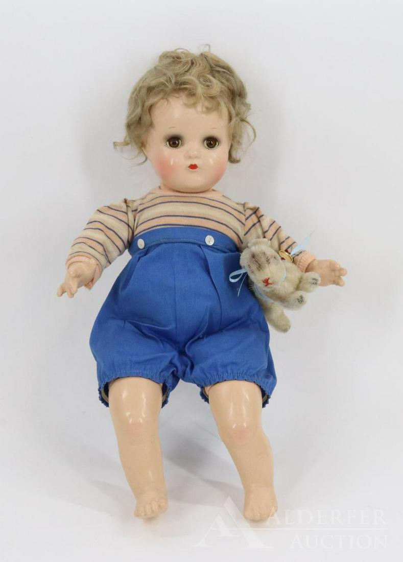 LOT OF COMPOSITION DOLLS.: 16" 1949-1951 All original tagged Madame Alexander "Butch" doll. Brown sleep eyes, honey blonde mohair wig. Dressed in 1 pc. striped knit shirt and blue cotton pants. NO shoes. He is holding a tagged 