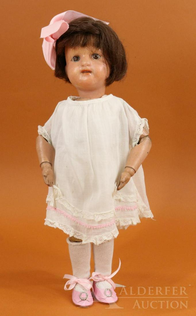 SCHOENHUT LOT.: 15" Schoenhut Model No. 316 "Miss Dolly". Painted brown eyes, open/closed mouth with teeth showing. Replaced dark brown human hair wig. Incised mark on back of torso. No original clothing, shoes. Redr