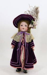 GERMAN BISQUE HEAD DOLL.: 15 1/2" ARMAND MARSEILLE A.975.M GERMANY 2 doll with blue sleep eyes, open mouth, brown mohair wig. Papier mache jointed body. Dressed in vintage/newer clothing - trimmed purple velvet coat with match