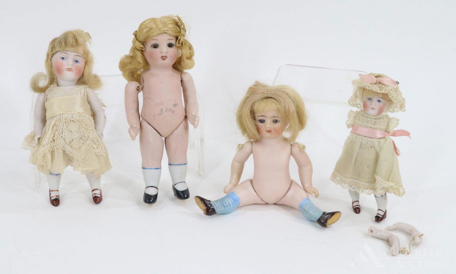 LOT OF ALL BISQUE DOLLS. (1 of 14)