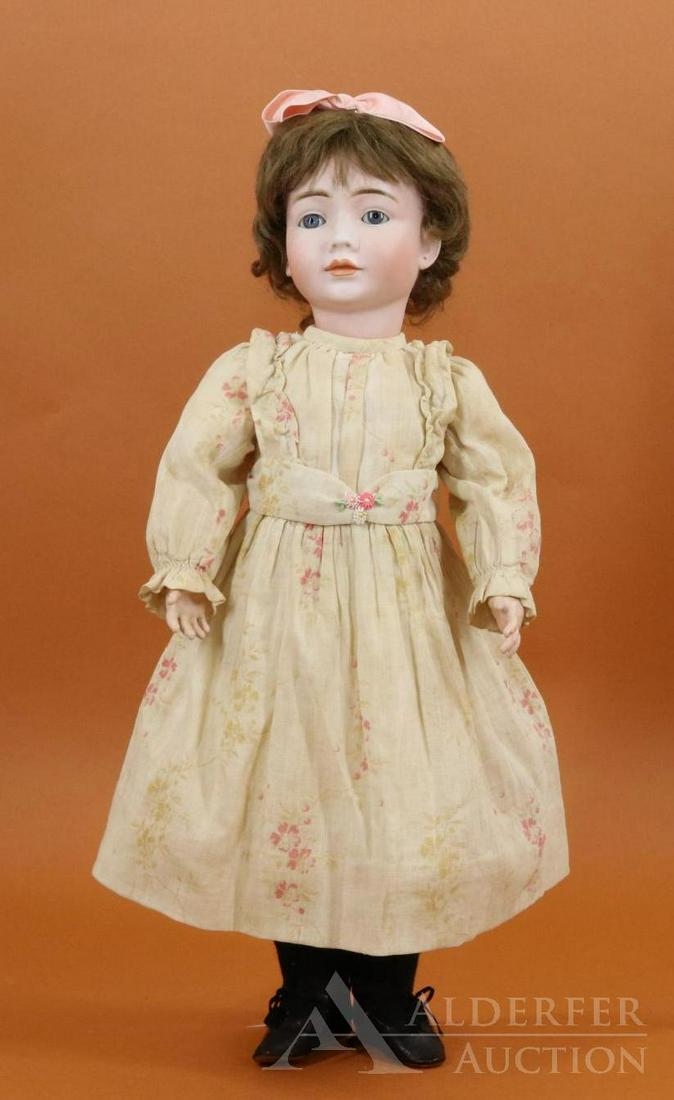 GERMAN BISQUE HEAD CHARACTER DOLL.: 16 1/2" 0 2033 B S W (in heart symbol) 537 Doll. (This doll by Bruno Schmidt, is the so-called Wendy.) Blue sleep eyes, closed mouth, pierced ears, newer brown mohair wig. Papier mache ball jointed bo