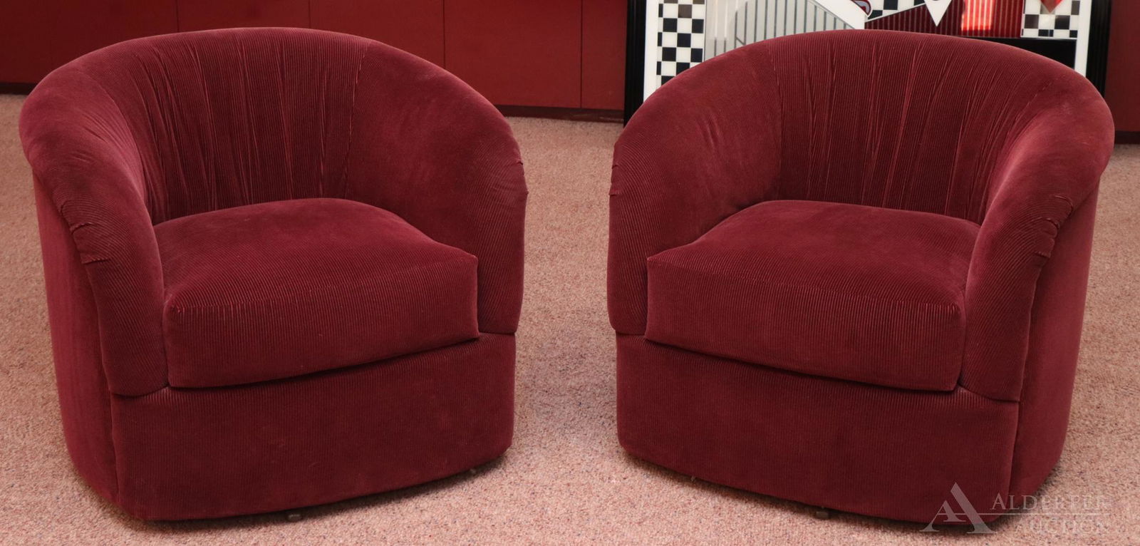 Barrel Back Chairs: Burgundy corduroy fabric on swivel bases. 25"h x 31"w x 24"d PLEASE NOTE: This lot was photographed on location in it's original setting. All other items visible that are not described herein are not