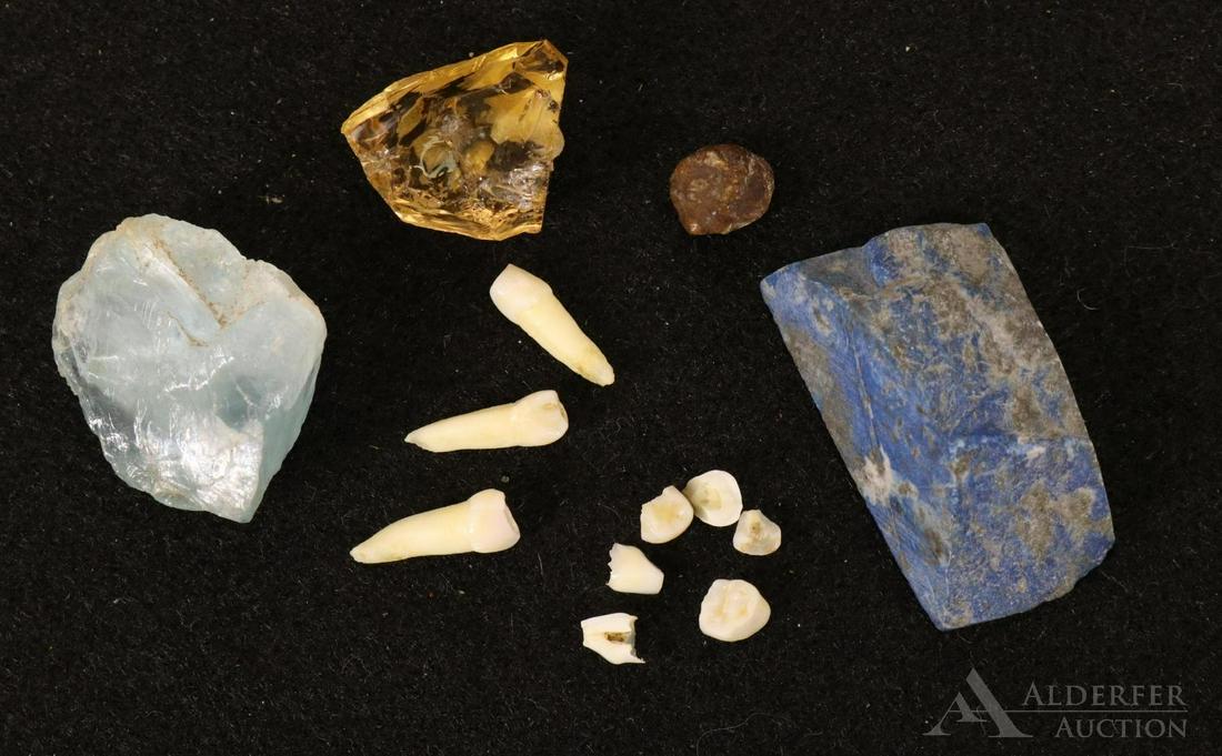 Gemstones: Gemstones including aquamarine (0.5” x 1” x 1”), citrine (0.5” x 1” x 0.75”), and sodalite (1” x 1.75” x 0.75”), also includes teeth.