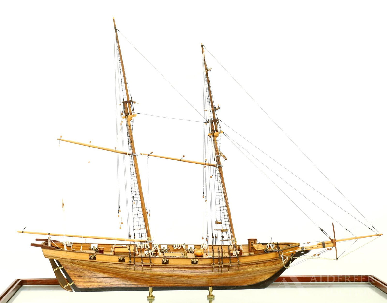 1850 Baltimore Clipper "Harvey Model Ship: Hand built model of the 1850 Baltimore clipper ship "Harvey" an 8 gun privateer ship. 27"h x 36"w. Includes glass case 33"hx 39"w