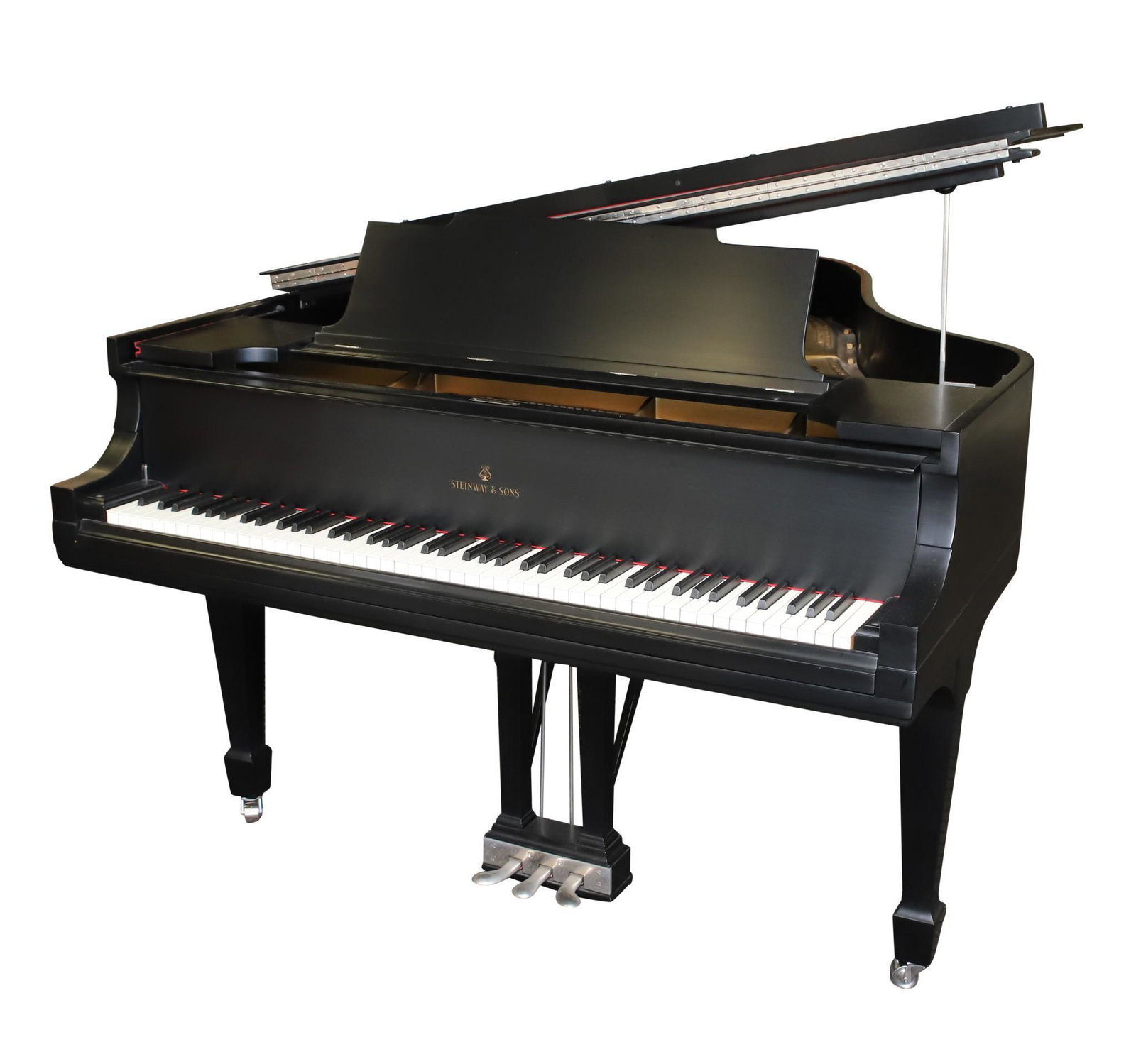 Steinway Baby Grand Piano: Model M. Serial No. 183098. Black satin finish. 39"h (70"h fully open) x 56"w x 60"d with flip top seated bench 19"h x 34"w x 15"d