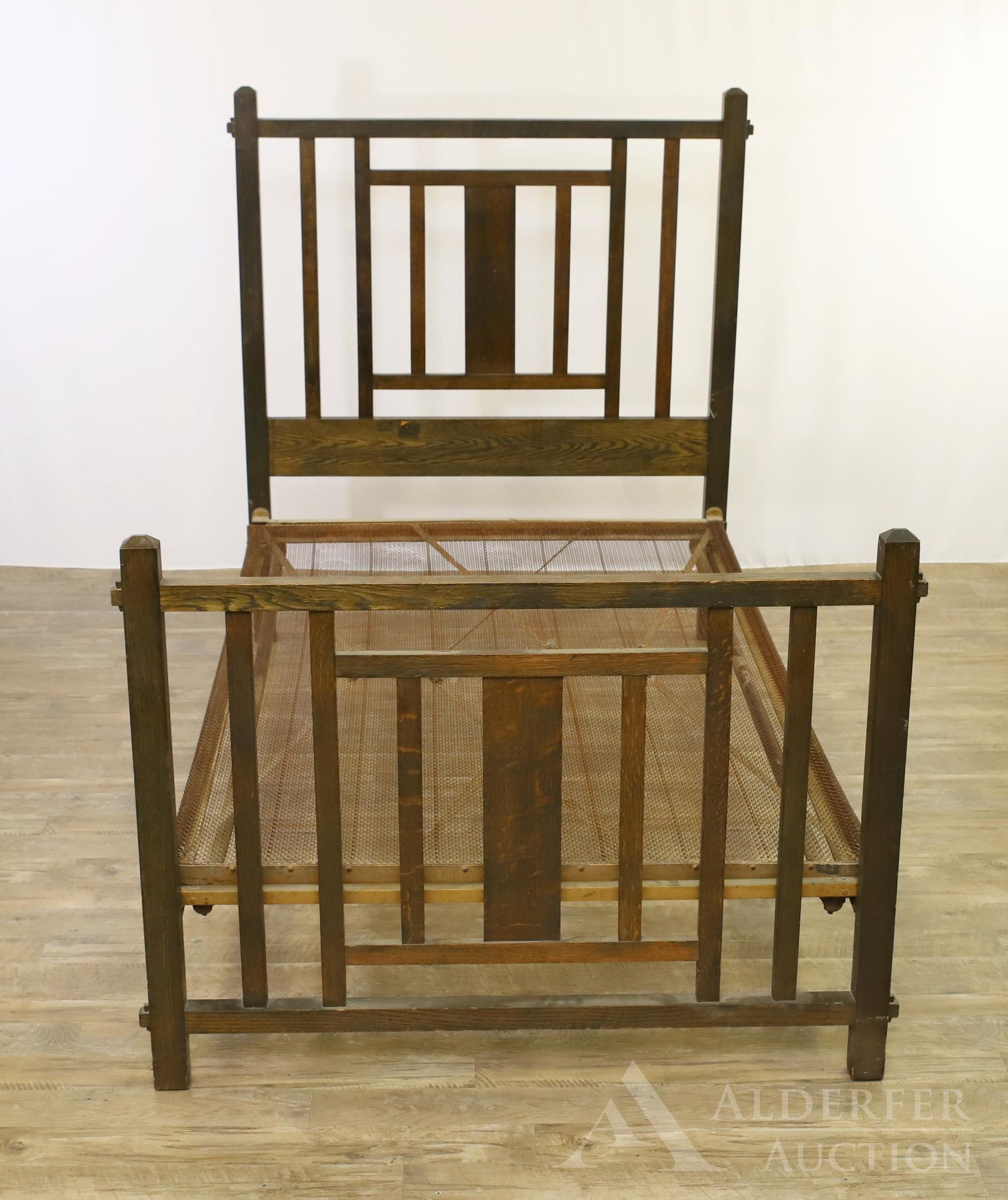 Hall & Lyon, Mortis And Tenon Bed: Oak. Marked with original paper label ''Hall & Lyon Furniture Co.' 56"h x 49"w x 81"d
