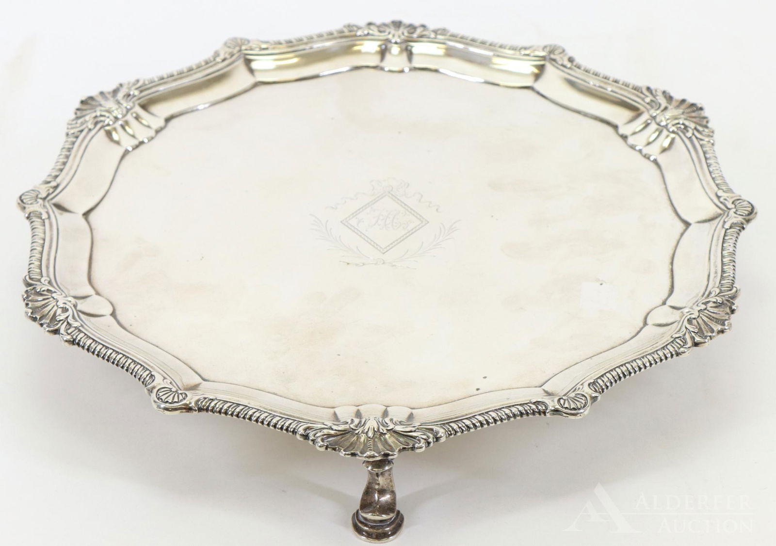 Robert Wilson Coin Silver Salver: Circular salver with shell and gadrooned border set upon hoof feet. Monogrammed (Identical to previous lot). 41.6ozt and 2"h x 14" round