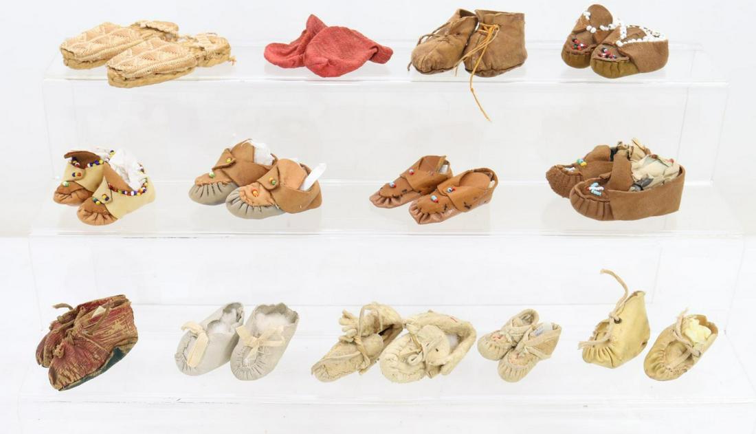 LOT OF ANTIQUE/VINTAGE ACCESSORIES.: Lot of antique doll shoes - Moccasins/type, Sandals. Moccasins/type: (10) prs. of leather, mostly beaded. (1) Pr. oilcloth. Pair of socks. Also - pair of woven sandals. Condition: age loss, discolorat