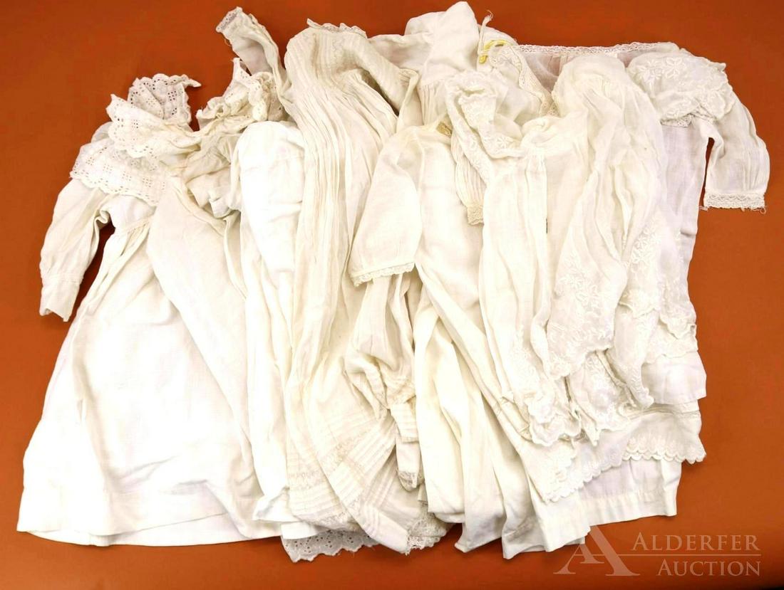LOT OF ANTIQUE/VINTAGE BABY/CHILDREN'S CLOTHING.: Lot of antique white cotton clothing. Baby - (4) long gowns. Condition: blue stains on (1) gown. Children's - (4) dresses inc. pique with eyelet collar and neck ruffle. This lot is being sold AS IS.